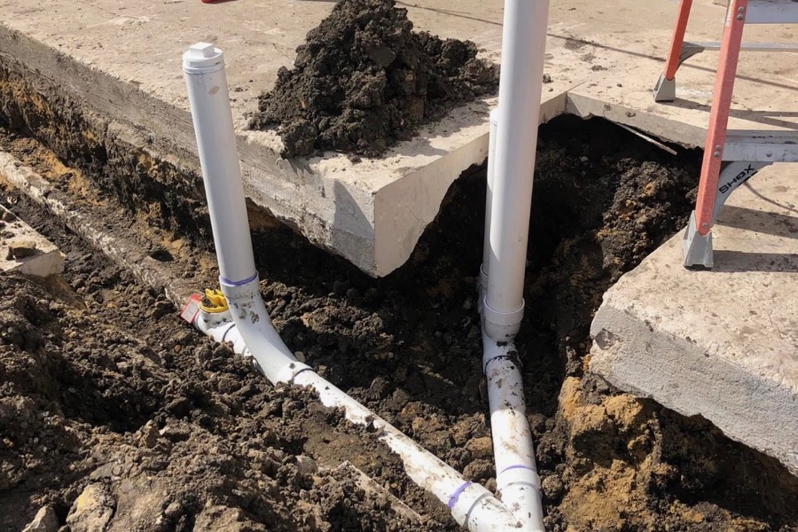 Sewer line and cleanout work outside a commercial building